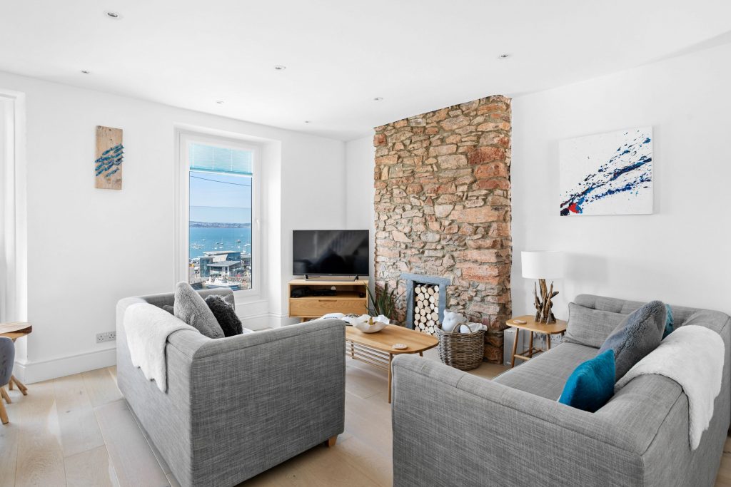 Open plan living room with views over the harbour